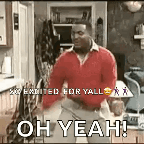 a man in a red sweater is dancing in a kitchen with the words `` so excited for yall oh yeah ! ''
