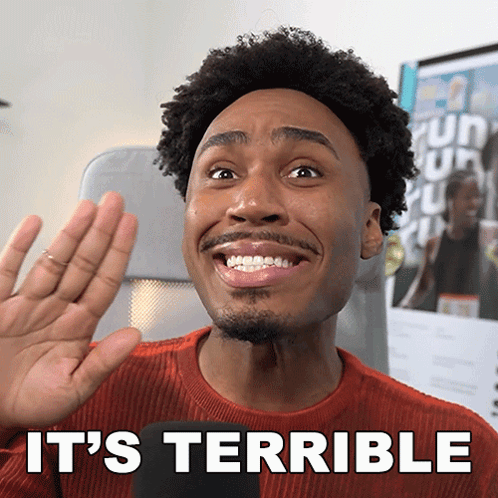 A Man In A Red Sweater Says It 'S Terrible While Smiling GIF