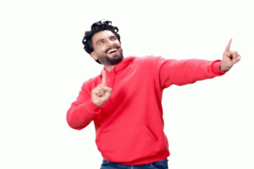 A Man In A Red Sweatshirt Is Pointing Up With His Fingers GIF