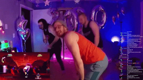 A Man In A Red Tank Top Is Dancing In Front Of A Screen That Says Just Dance On It GIF