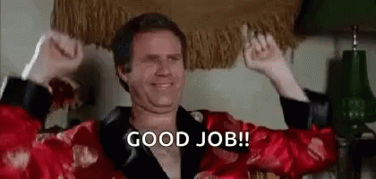 A Man In A Robe Is Celebrating With His Arms In The Air And Says `` Good Job '' . GIF