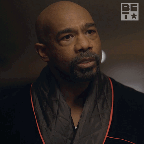 A Man In A Robe Says Tell Me What Happened While Pointing GIF