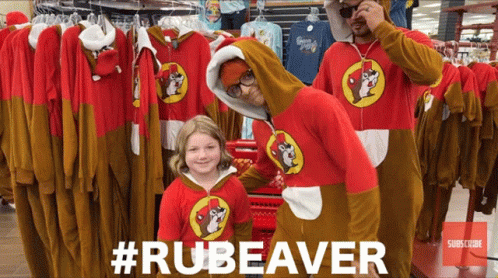 A Man In A Rubeaver Costume Poses With A Little Girl GIF