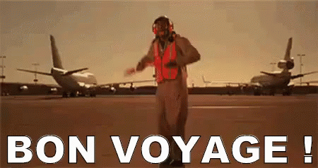 A Man In A Safety Vest Is Dancing On An Airport Runway With The Words Bon Voyage Written Below Him GIF