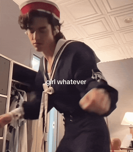 A Man In A Sailor Outfit Is Dancing With The Words Girl Whatever Above Him GIF