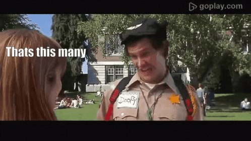 A Man In A Sheriff 'S Uniform Talks To A Girl In A Park GIF