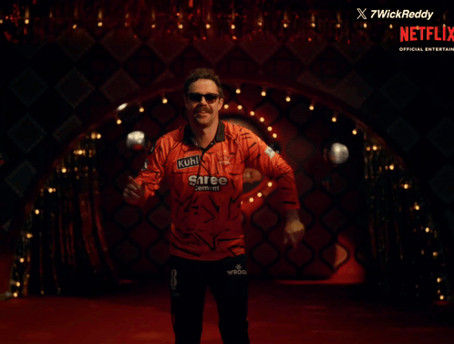 A Man In A Shree Cement Shirt Is Dancing GIF