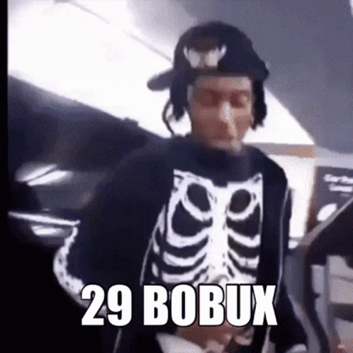 A Man In A Skeleton Costume Is Wearing Headphones And A Hat With The Words 29 Bobux Written On It . GIF
