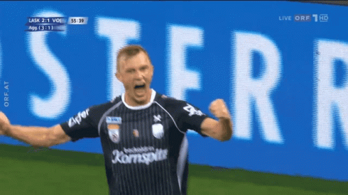 a man in a soccer jersey with the word kornspitz on it