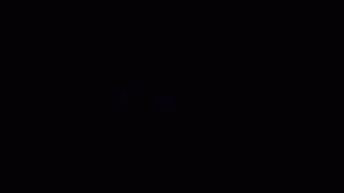 A Man In A Space Suit Is Sitting In Front Of A Screen That Says ' A ' On It GIF