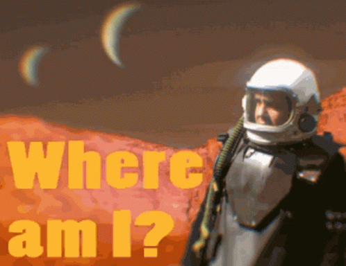 a man in a space suit is standing in front of a poster that says where am i