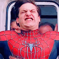 A Man In A Spider-Man Costume Is Making A Funny Face . GIF