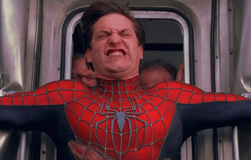 A Man In A Spider Man Costume Making A Funny Face GIF