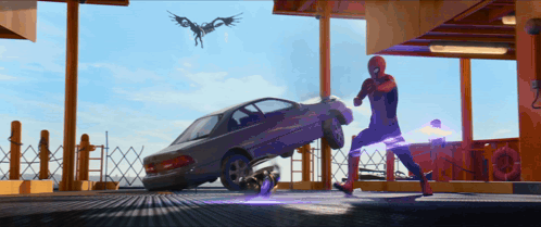 A Man In A Spiderman Costume Is Kicking A Car In A Parking Garage GIF