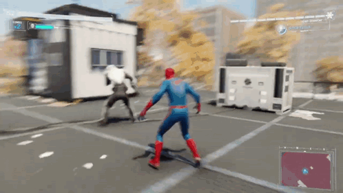 A Man In A Spiderman Costume Is Playing A Video Game . GIF