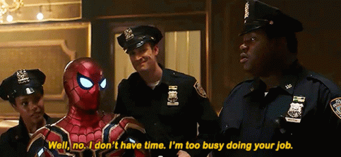a man in a spiderman costume is standing next to two police officers and says well no i don 't have time