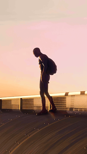A Man In A Spiderman Costume Is Standing On A Roof GIF