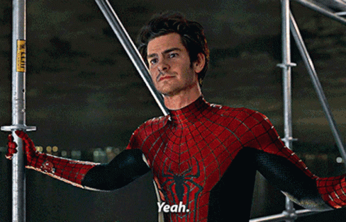 A Man In A Spiderman Costume Is Standing On A Scaffolding And Says Yeah GIF