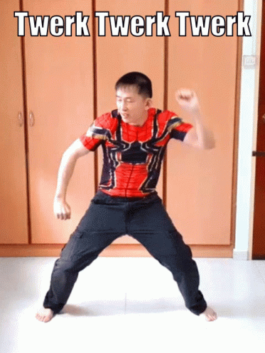 A Man In A Spiderman Shirt Is Doing A Twerk GIF
