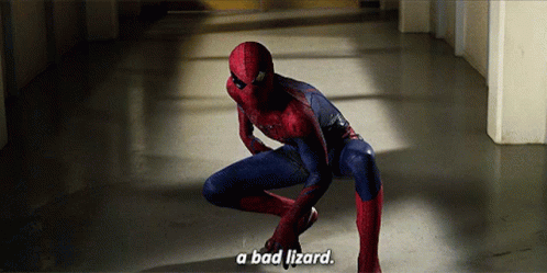 A Man In A Spiderman Suit Is Kneeling Down And Says " A Bad Lizard " GIF