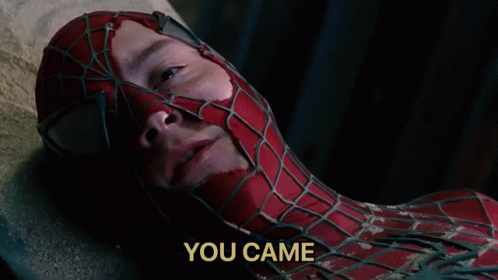 A Man In A Spiderman Suit Is Laying On The Ground With The Words " You Came " Below Him GIF