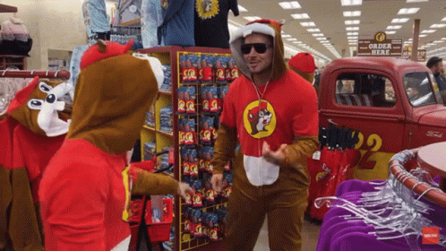 A Man In A Squirrel Costume Is Standing In Front Of A Truck That Says Order Here GIF