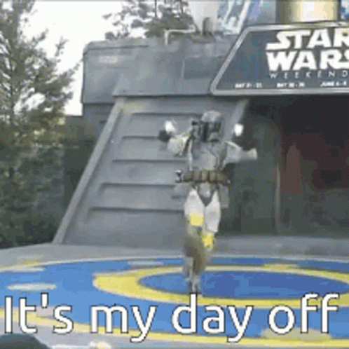 A Man In A Star Wars Costume Is Dancing In Front Of A Sign That Says It 'S My Day Off GIF