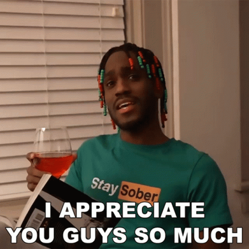A Man In A Stay Sober Shirt Holds A Glass Of Wine GIF