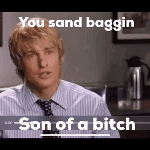 A Man In A Striped Shirt And Tie Is Saying You Sand Baggin Son Of A Bitch . GIF