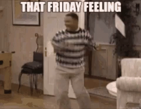 A Man In A Striped Shirt Is Dancing In A Living Room . GIF