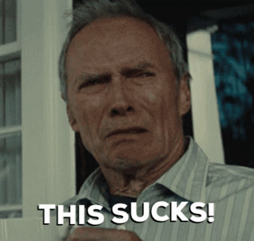 A Man In A Striped Shirt Is Holding A Cup And Says " This Sucks " GIF