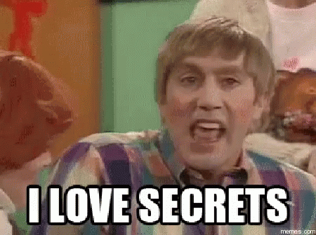 A Man In A Striped Shirt Is Screaming And Saying `` I Love Secrets '' . GIF