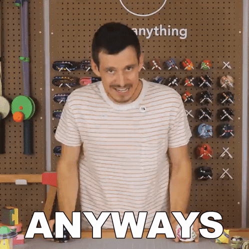 A Man In A Striped Shirt Is Standing In Front Of A Wall That Says Anyways GIF