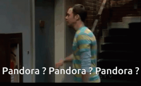 A Man In A Striped Shirt Is Walking Down Stairs And Talking To Another Man . GIF