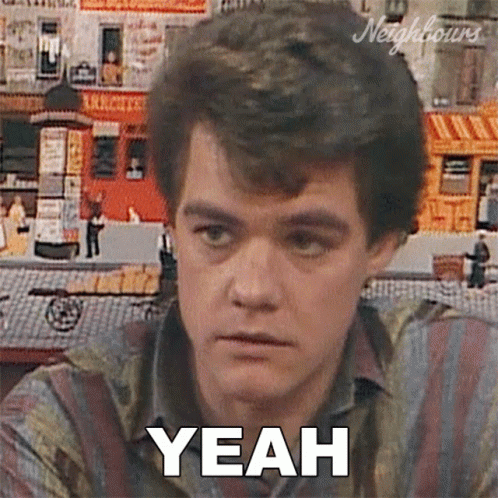 A Man In A Striped Shirt Says Yeah In Front Of A Collage Of Buildings GIF