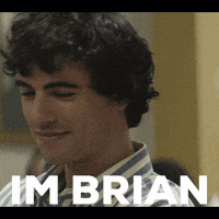 A Man In A Striped Shirt With The Name Brian On The Bottom Right GIF