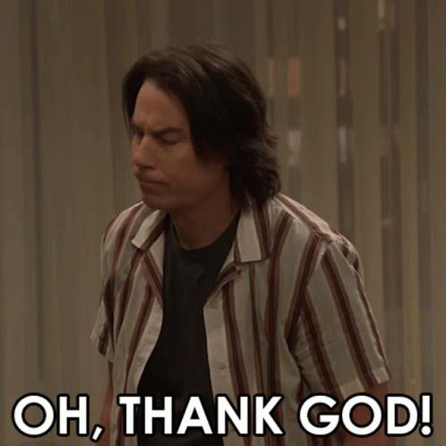 A Man In A Striped Shirt With The Words Oh Thank God Below Him GIF