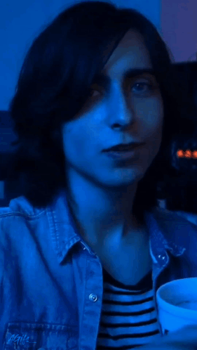 A Man In A Striped Shirt With The Words " The More You Know " On It GIF