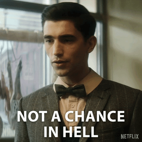A Man In A Suit And Bow Tie Has The Words Not A Chance In Hell Above Him GIF