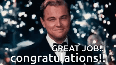 A Man In A Suit And Bow Tie Is Smiling And Saying `` Great Job Congratulations ! '' GIF