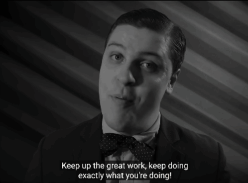 A Man In A Suit And Bow Tie Says Keep Up The Great Work Keep Doing Exactly What You Re Doing GIF