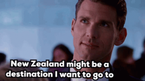 A Man In A Suit And Bow Tie Says New Zealand Might Be A Destination I Want To Go To GIF