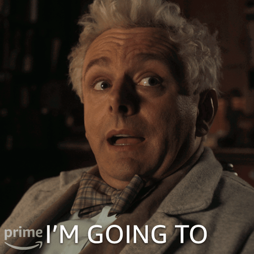 A Man In A Suit And Bow Tie With The Words Prime I 'M Going To Behind Him GIF