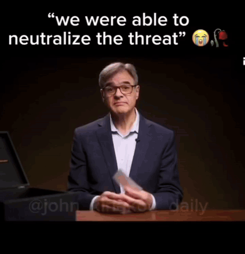 A Man In A Suit And Glasses Says " We Were Able To Neutralize The Threat " And " To Neutralize The Threat " GIF