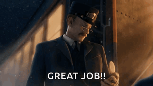 a man in a suit and hat is holding a piece of paper that says great job .
