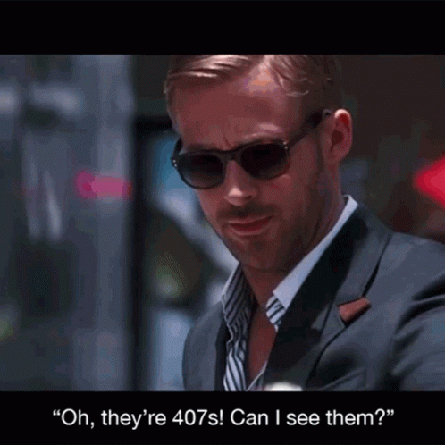 A Man In A Suit And Sunglasses Says " Oh They 'Re 407S Can I See Them ? " GIF