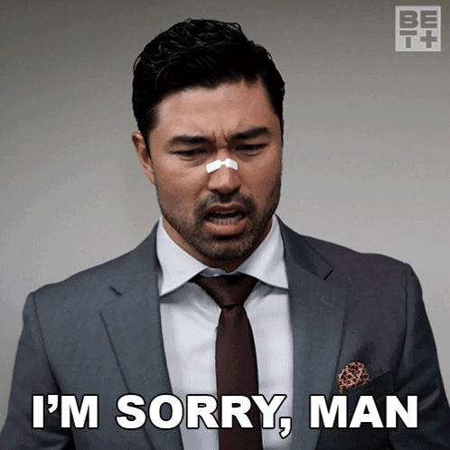 A Man In A Suit And Tie Has A Bandage On His Nose And Says I 'M Sorry Man GIF