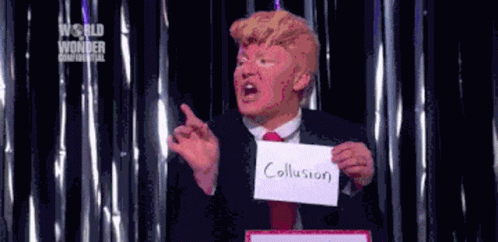 A Man In A Suit And Tie Holding A Sign That Says Collusion GIF
