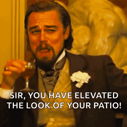 A Man In A Suit And Tie Holds A Glass Of Wine And Says Sir You Have Elevated The Look Of Your Patio GIF