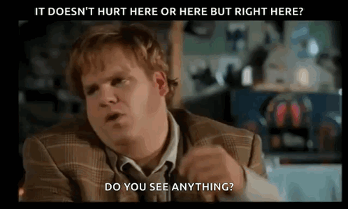 A Man In A Suit And Tie Is Asking If He Can See Anything GIF